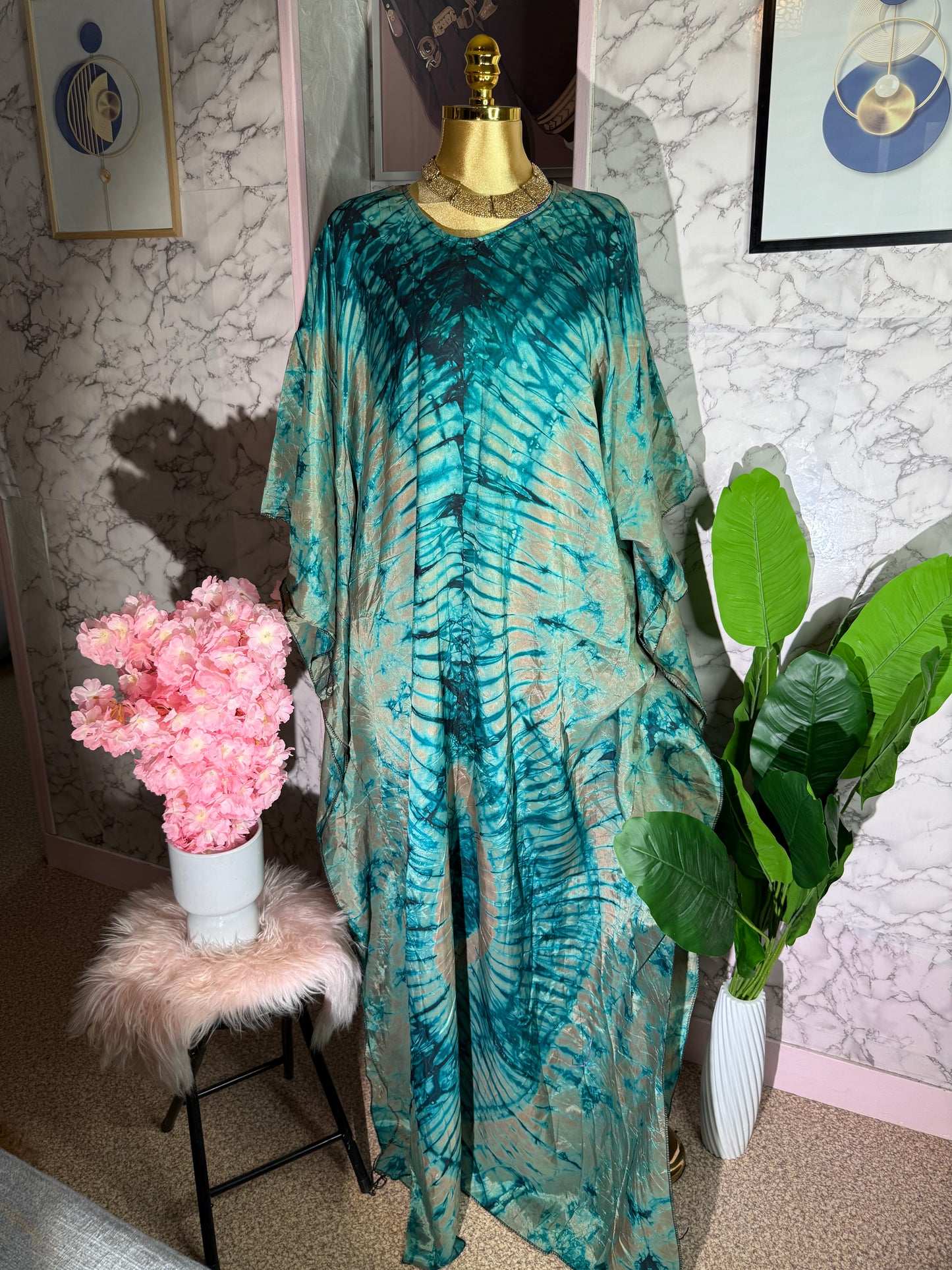 Adire bubu gown 
One size fits a uk 8-22 length